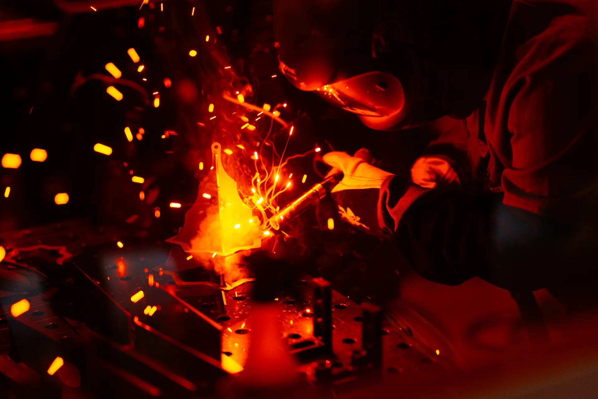 Intense welding sparks during championship competition